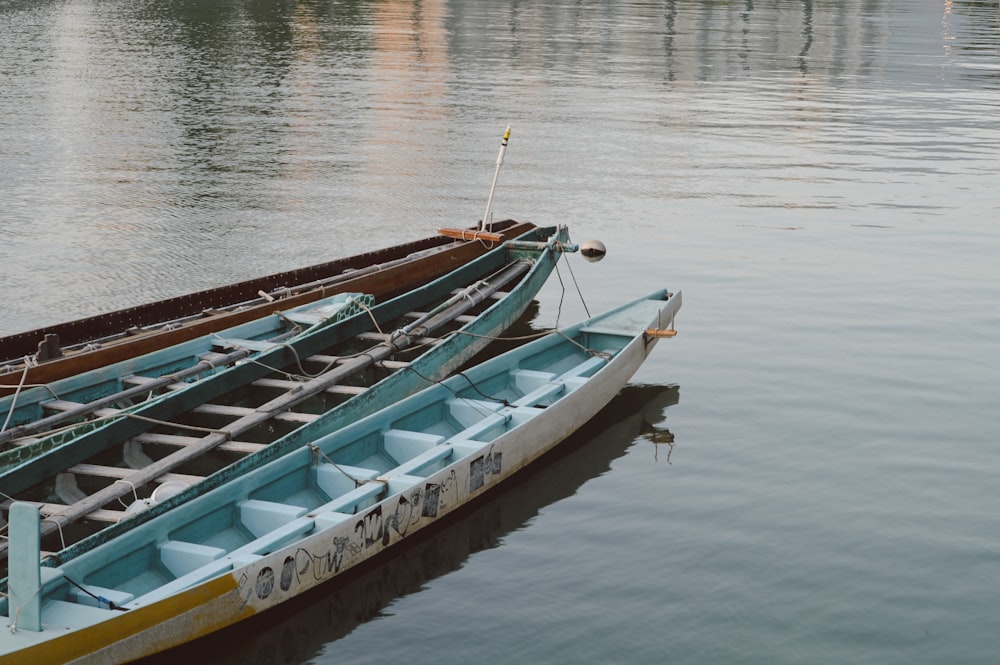 white and brown boat on water