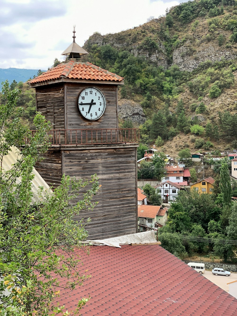 brown brick building near green trees during daytime