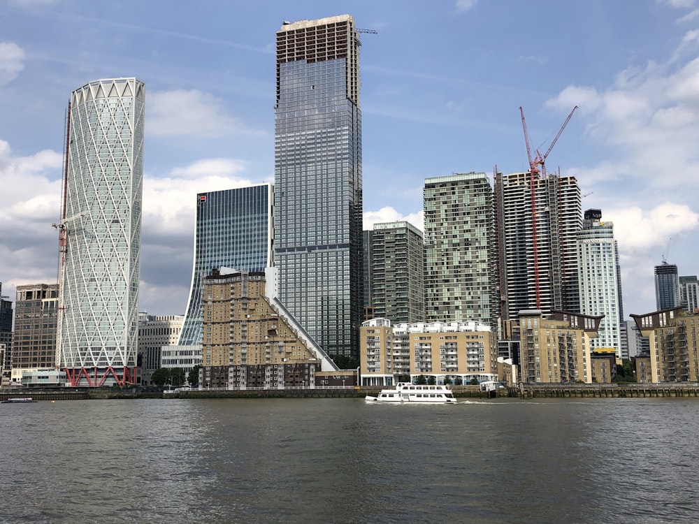 high rise building near body of water during daytime