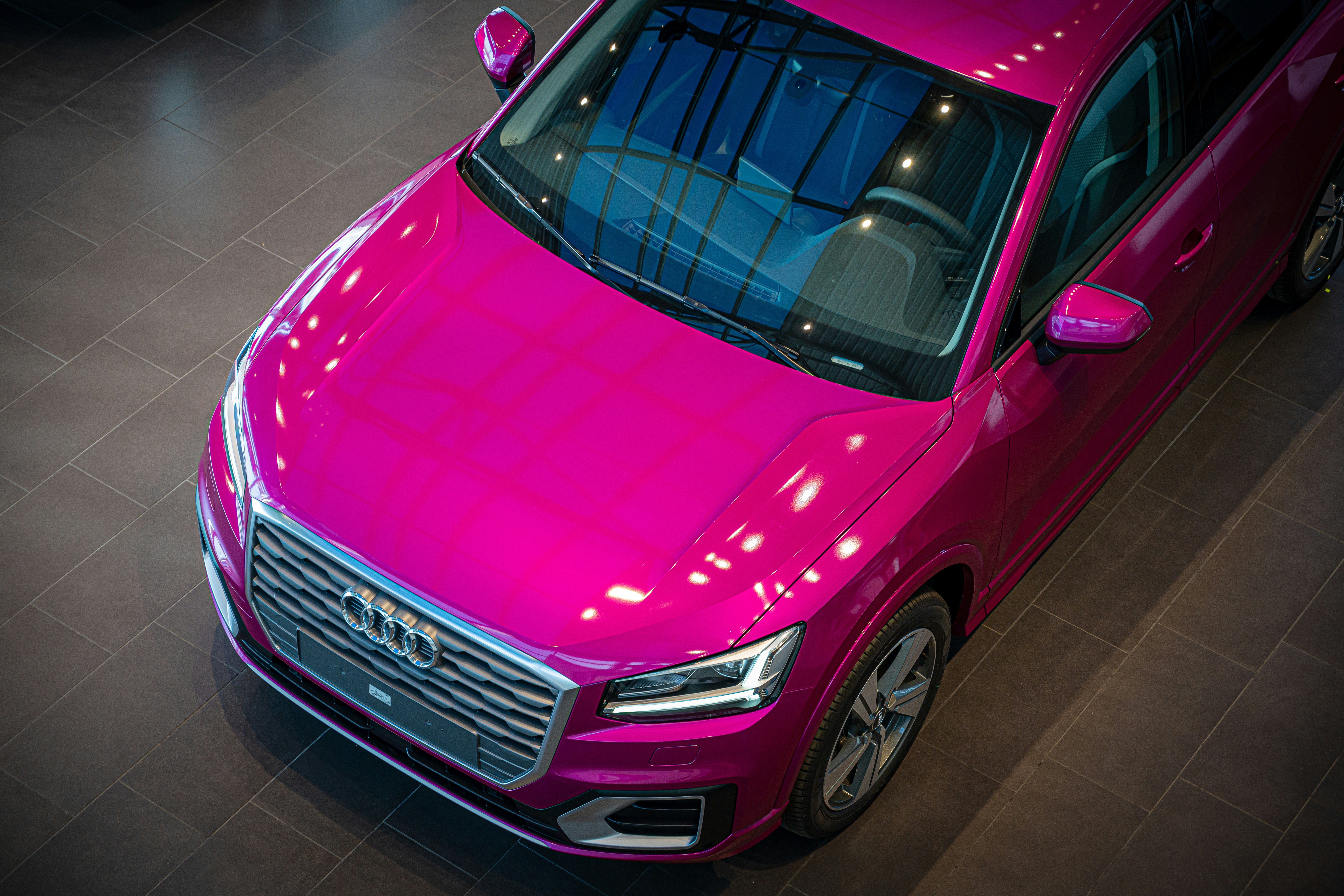 A colorful Audi Q2 in violet during a presentation event in Parma