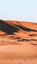 white and brown desert under blue sky during daytime