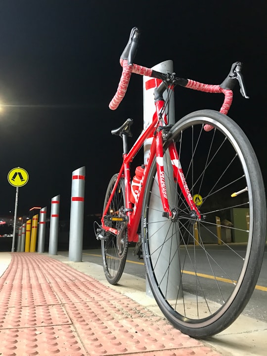 red and black road bike in Bowden South Australia Australia