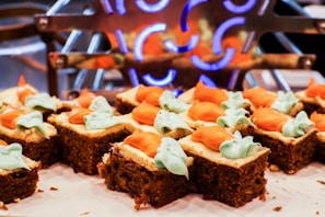 A joyful group of friends enjoying deconstructed cake desserts around the mobile cart.