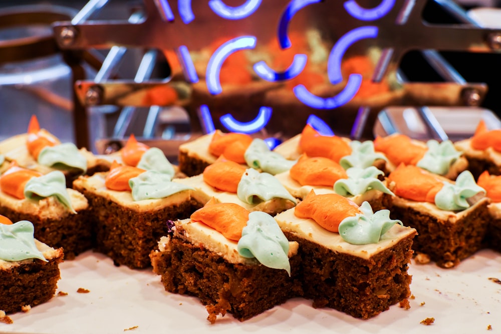 brown bread with sliced tomato and green vegetable on white ceramic plate