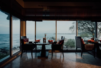 dining table and chairs near window