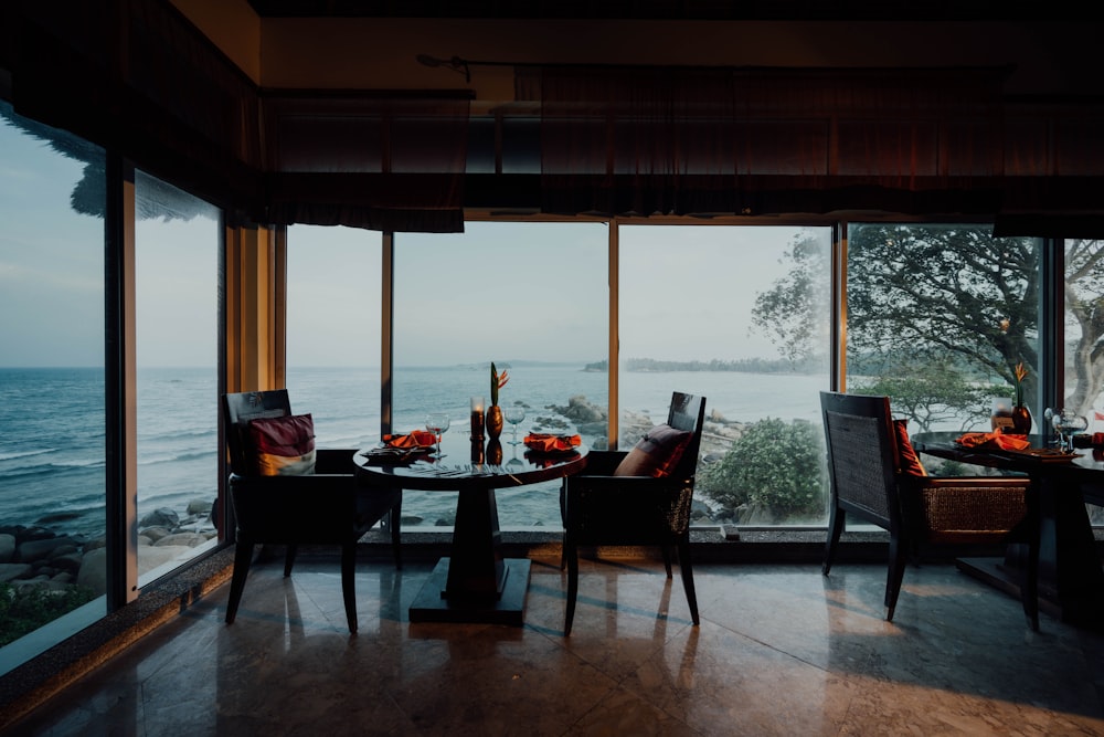 dining table and chairs near window