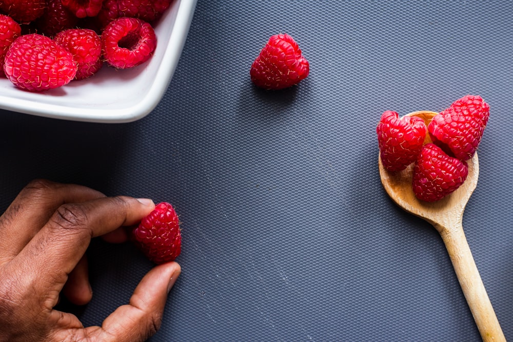 strawberries on white ceramic plate