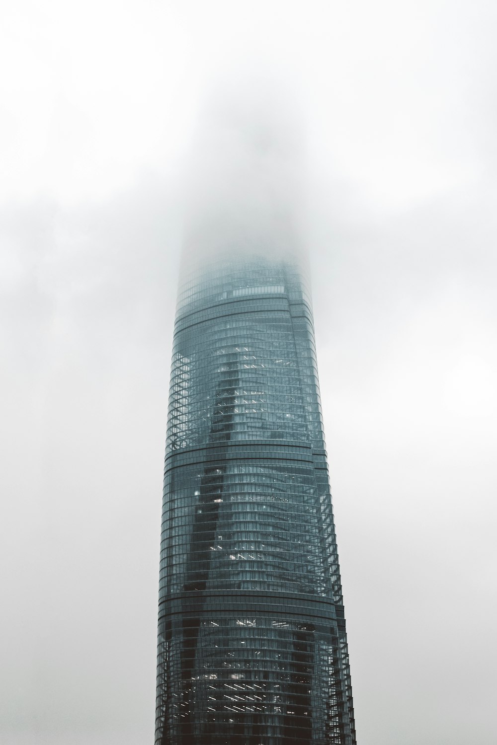 gray high rise building under white sky during daytime