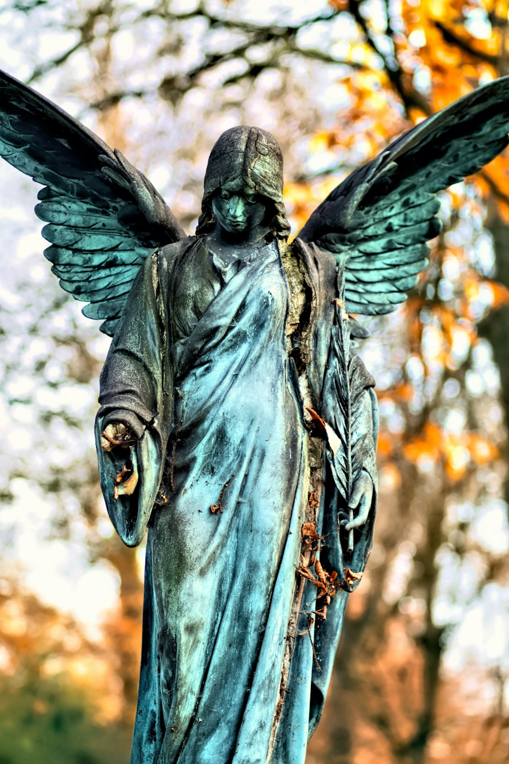 angel statue in close up photography