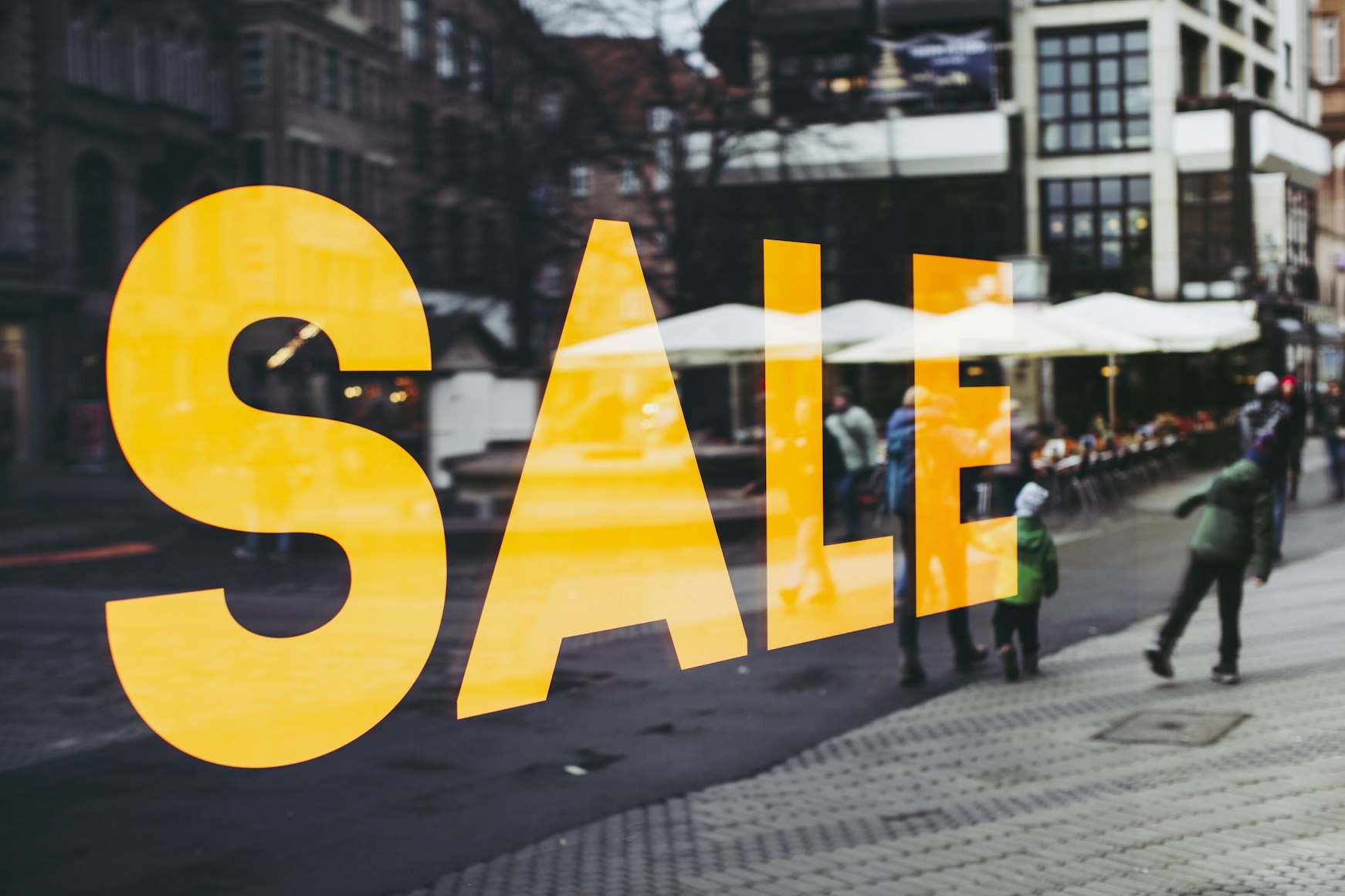 Unsplash image from Markus Spiske showing a sales sign