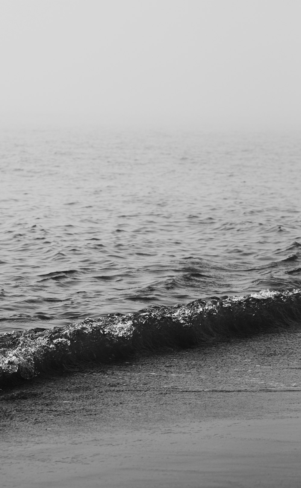 grayscale photo of ocean waves