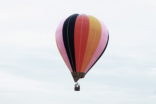 red yellow and blue hot air balloon in Kerala India