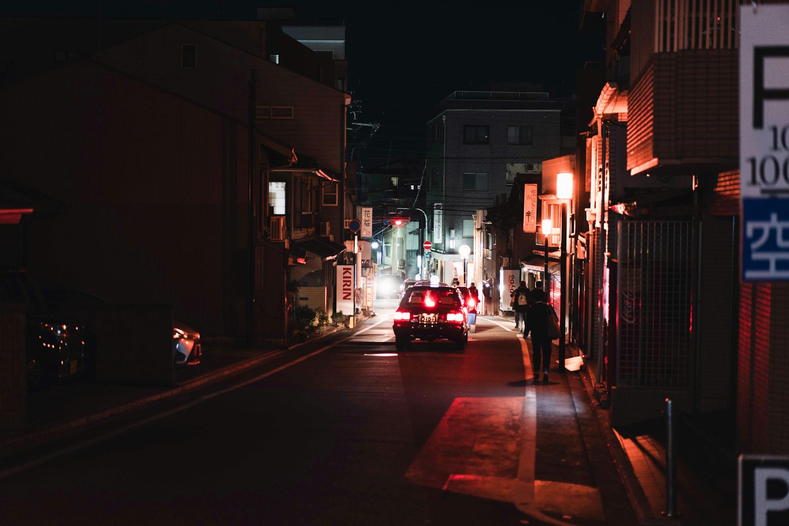 Sony a7R IV + Sony Sonnar T* FE 55mm F1.8 ZA sample photo. Red car on road photography