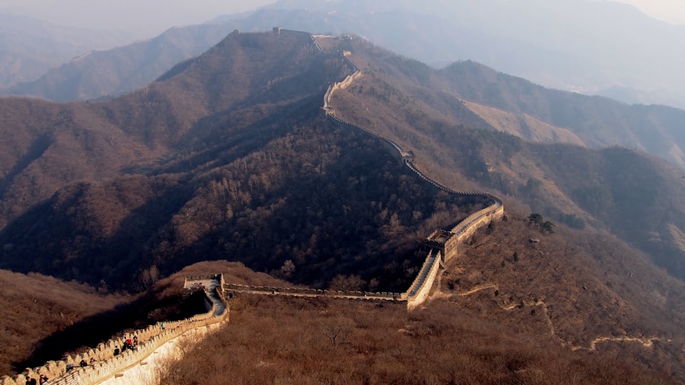 aerial view of green and brown mountains during daytime