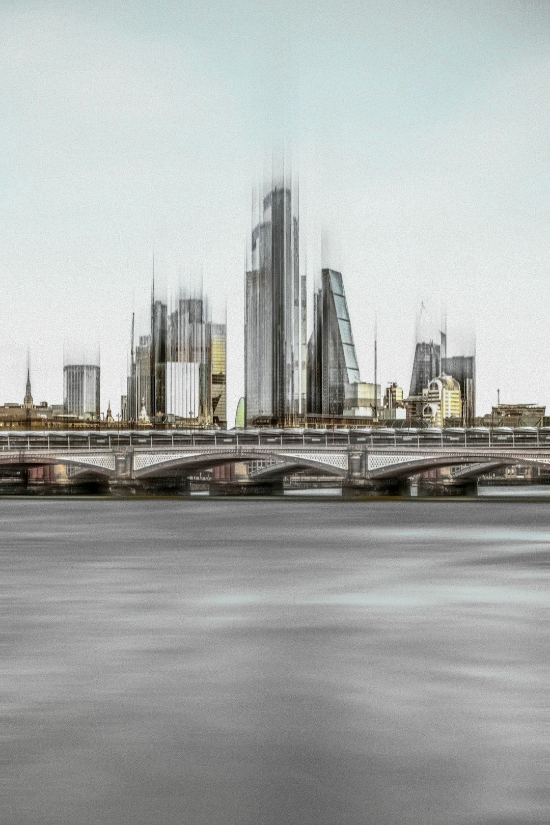 city skyline under white sky during daytime