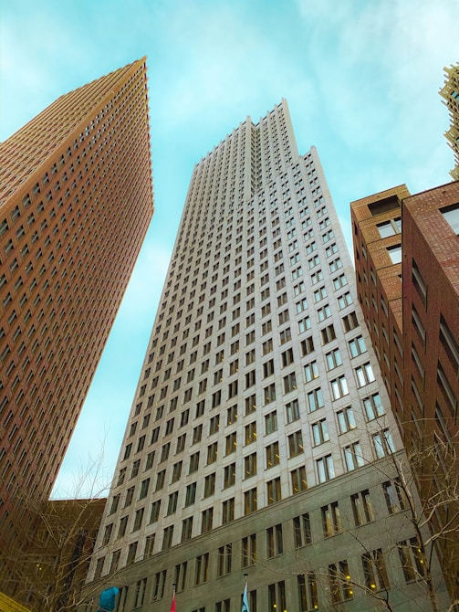 brown concrete building under blue sky during daytime