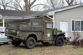 Storm Star Gutters van parked outside a home during a repair job.
