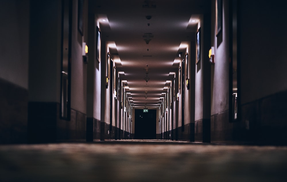 hallway with lights turned on in a hallway