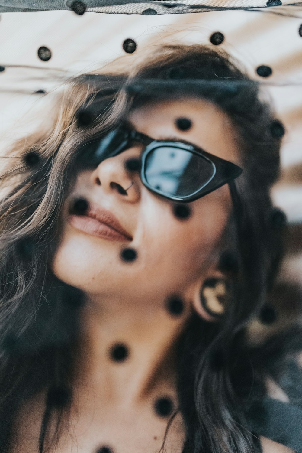 woman wearing black framed sunglasses