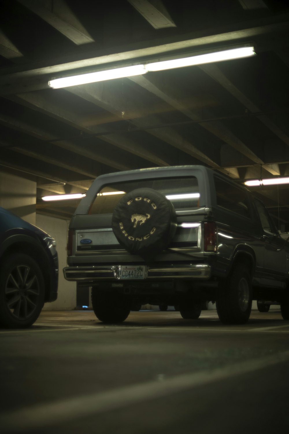 black suv in a garage