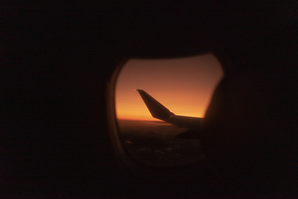 airplane wing during golden hour