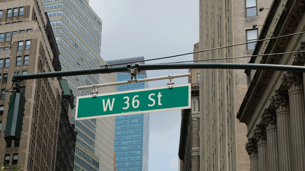 blue and white street sign