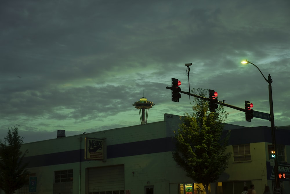 brown concrete building with red light