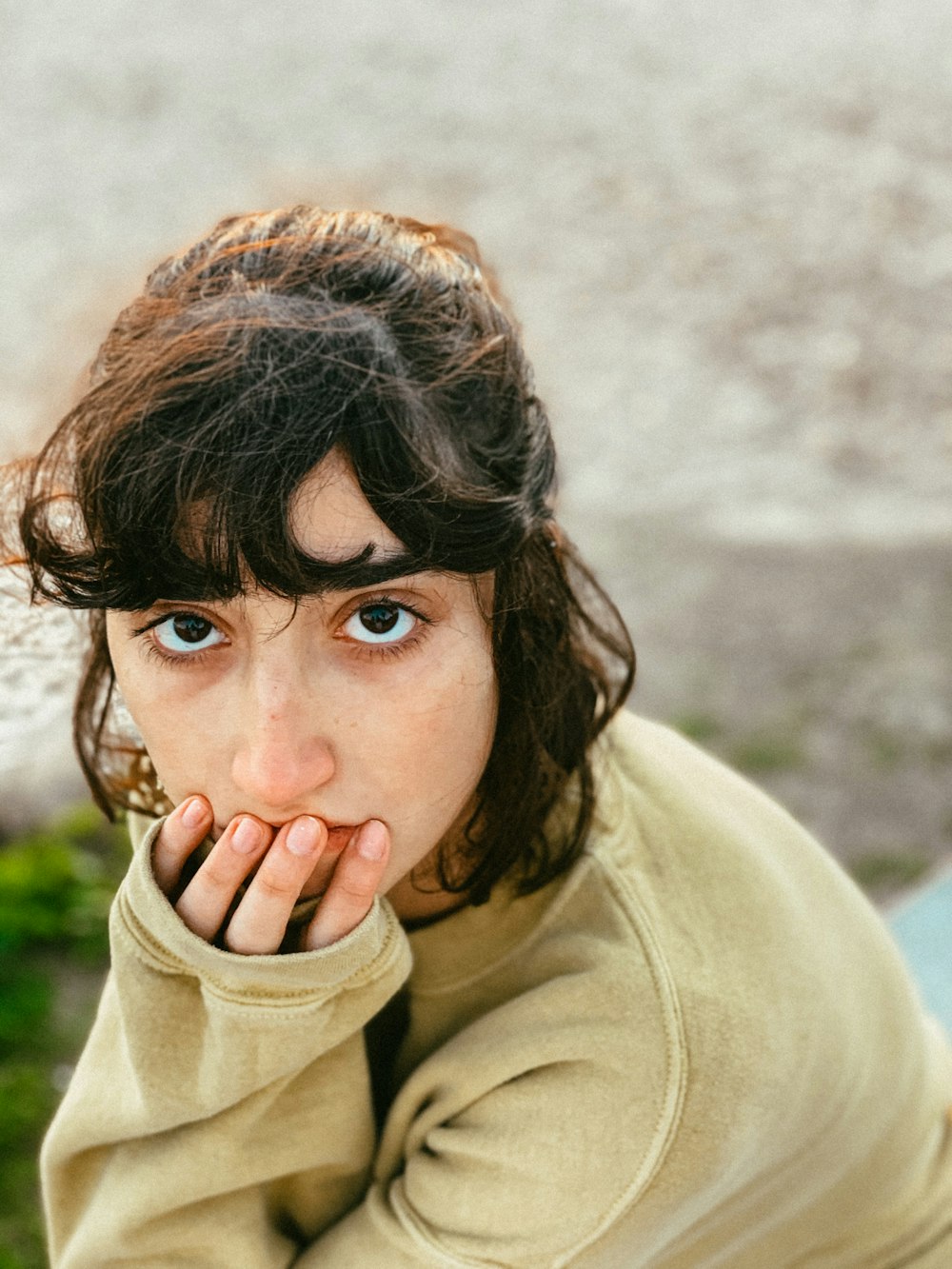 woman in brown turtleneck sweater