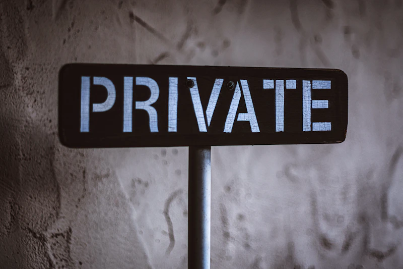 Black and white wooden sign