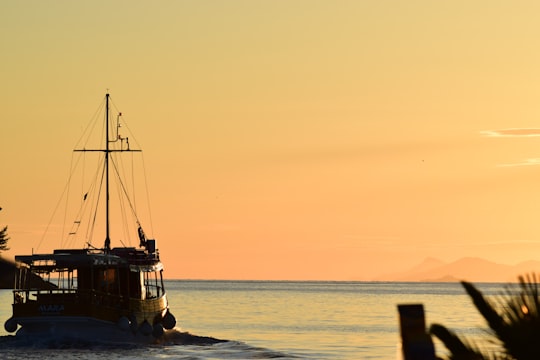 silhouette of boat on sea during sunset in Cavtat Croatia