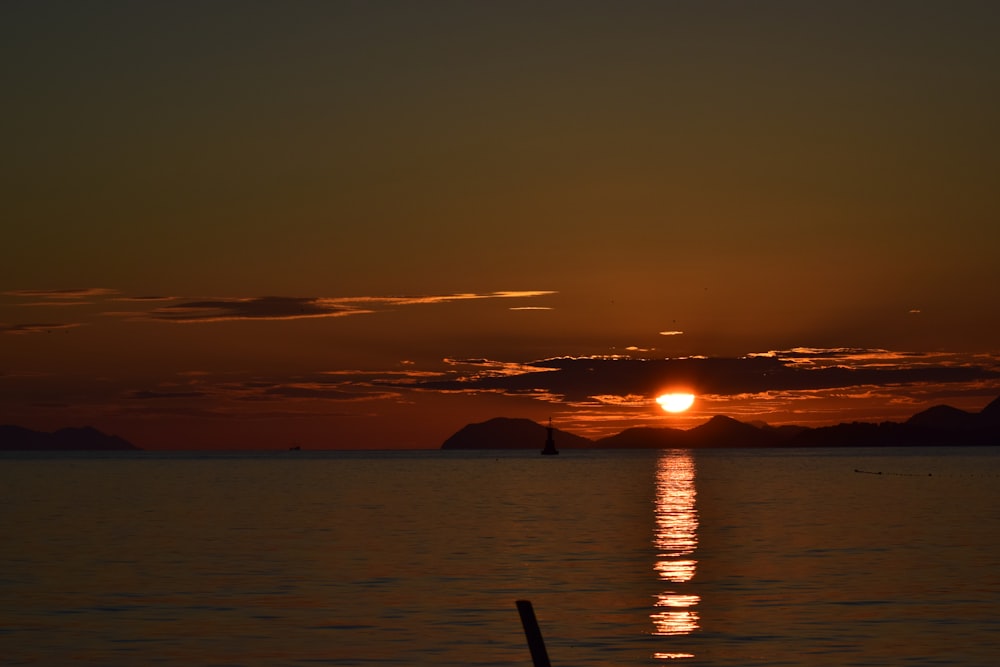 silhouette of mountain during sunset