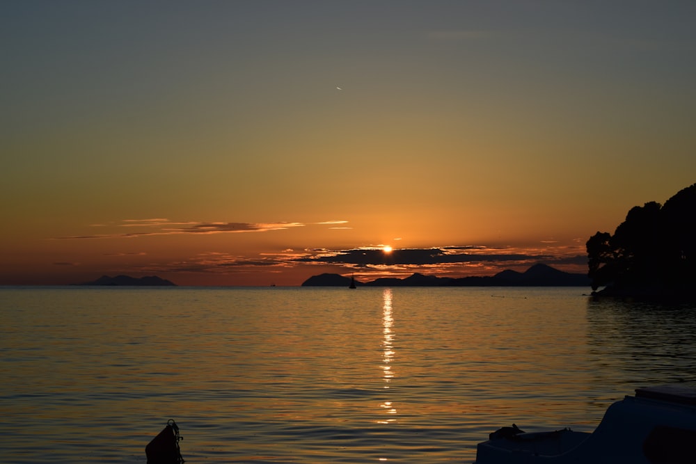 silhouette of mountain during sunset