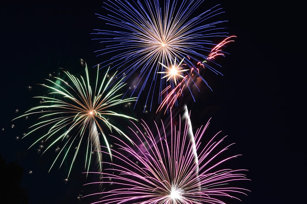 red and yellow fireworks display during nighttime