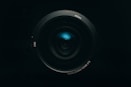 black camera lens on white background