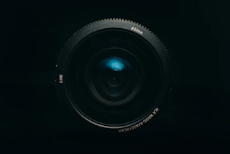 black camera lens on white background