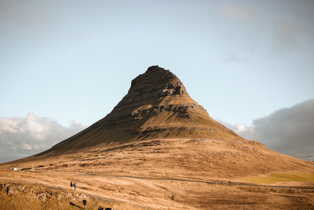 brown mountain under white sky during daytime