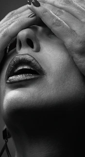 grayscale photo of persons eye