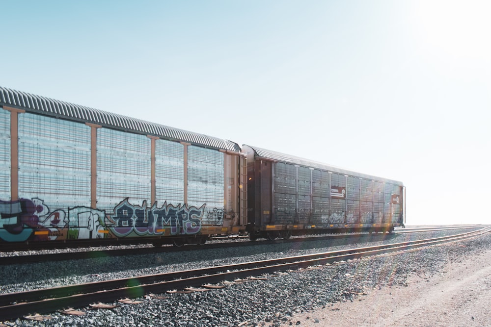 brown train rail during daytime