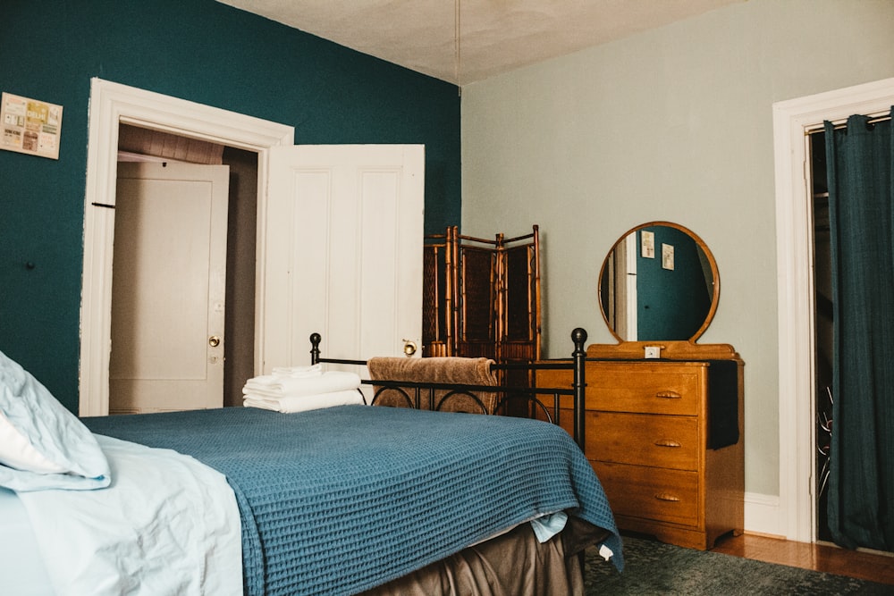 white bed linen on bed