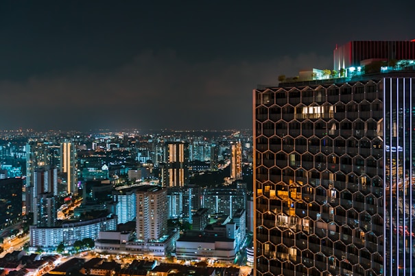 city with high rise buildings during night time