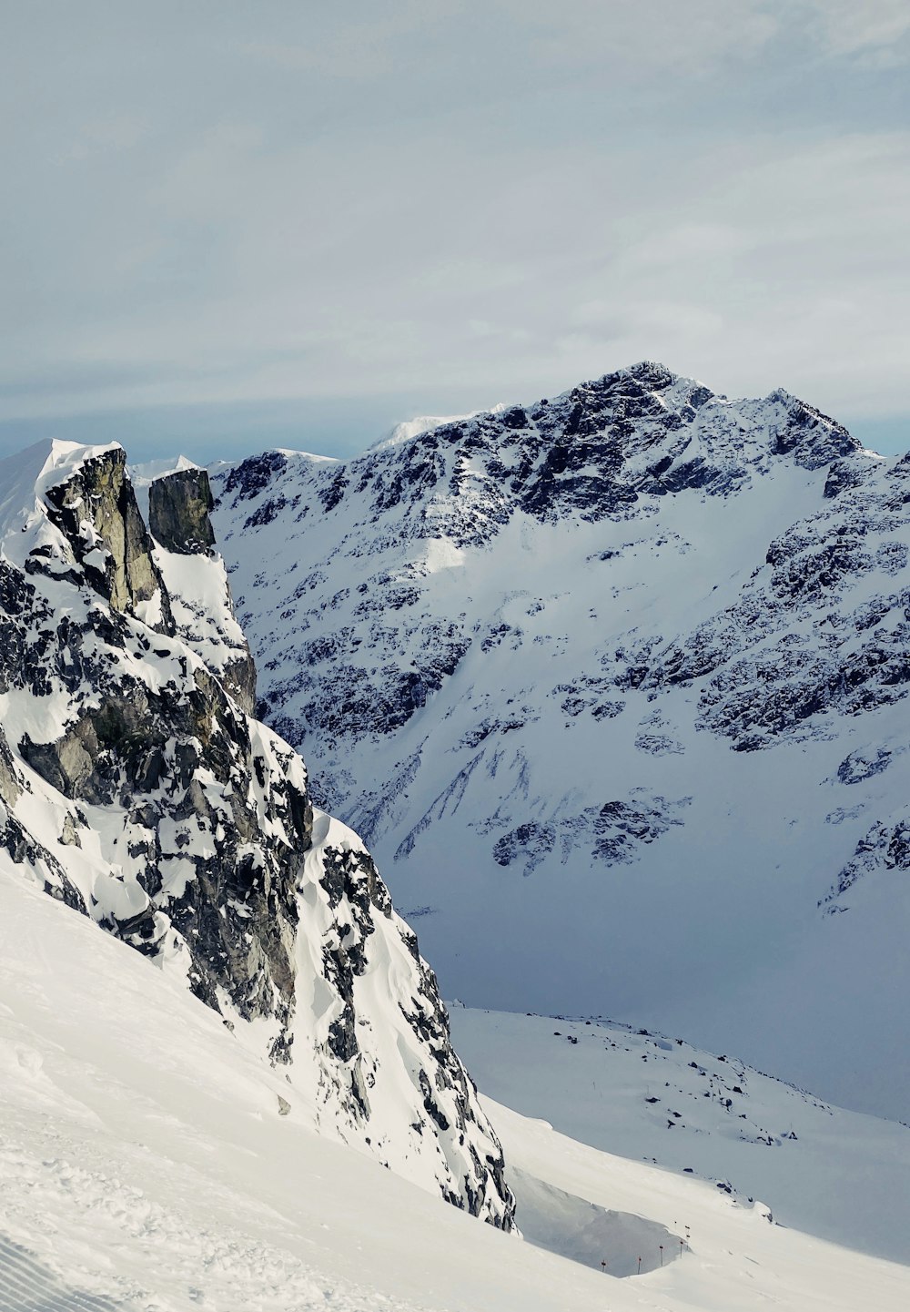 a person skiing down a snow covered mountain