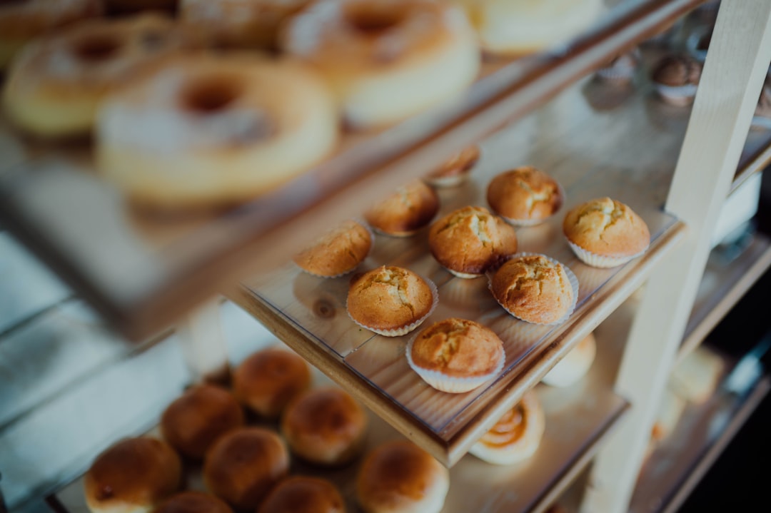 brown and white doughnuts on white tray