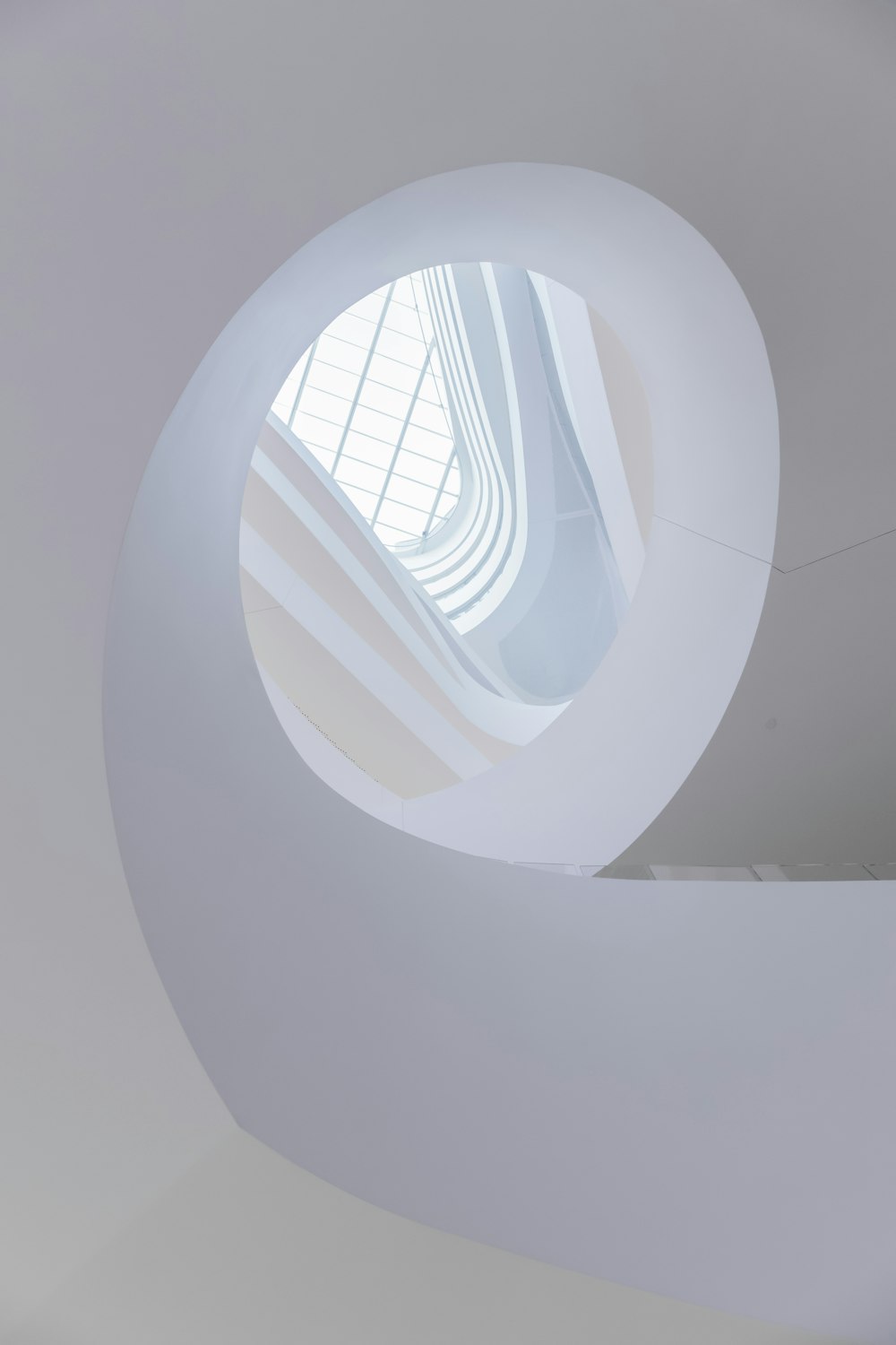 white spiral tunnel with white light