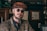 man in brown hat and black sunglasses