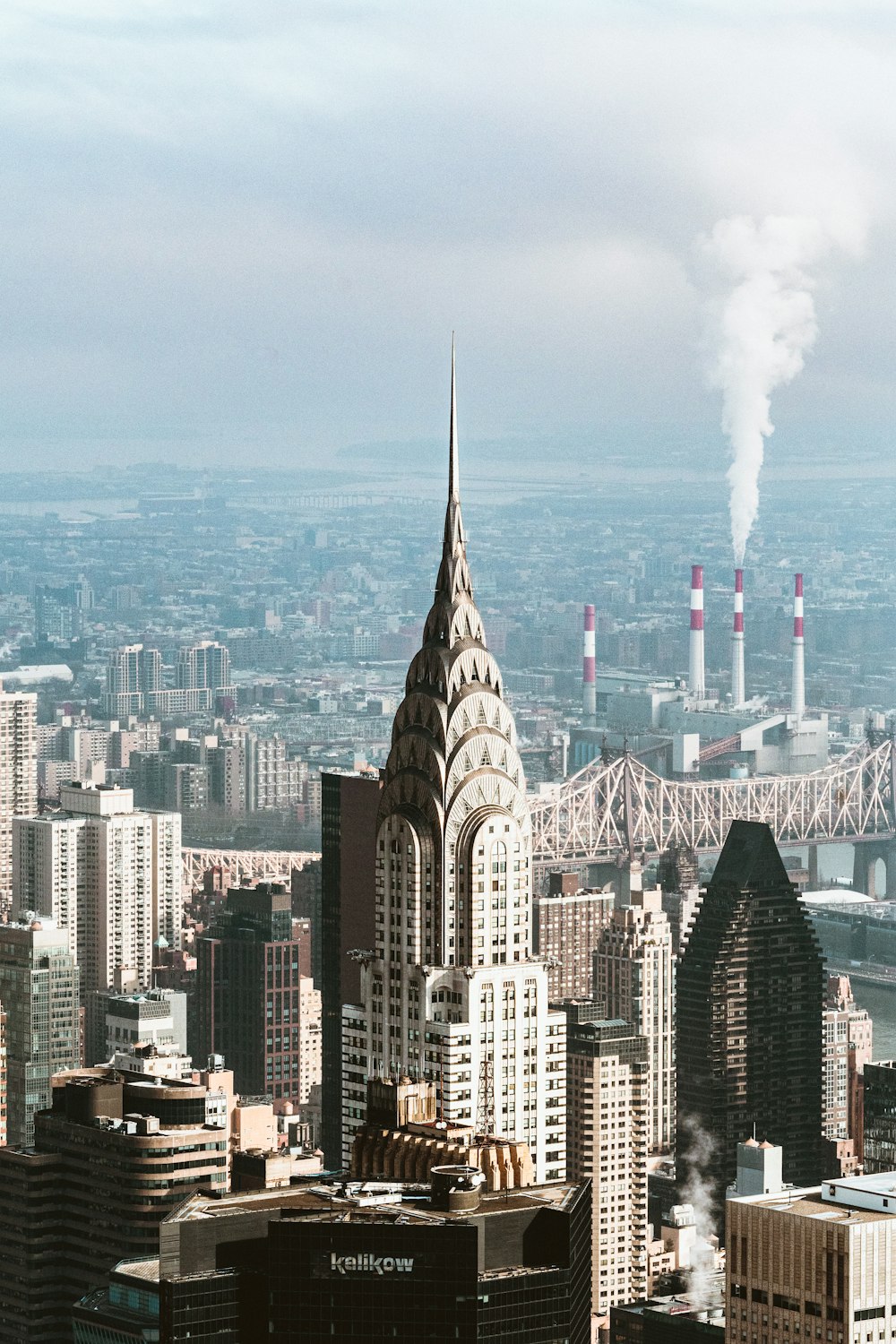 city with high rise buildings under blue sky during daytime