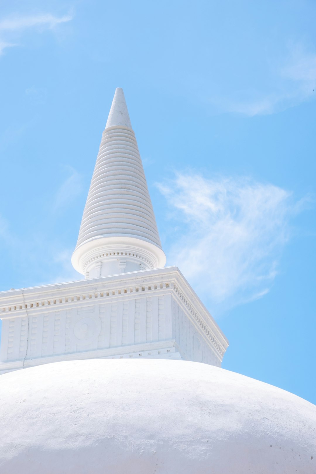 white concrete building under blue sky during daytime