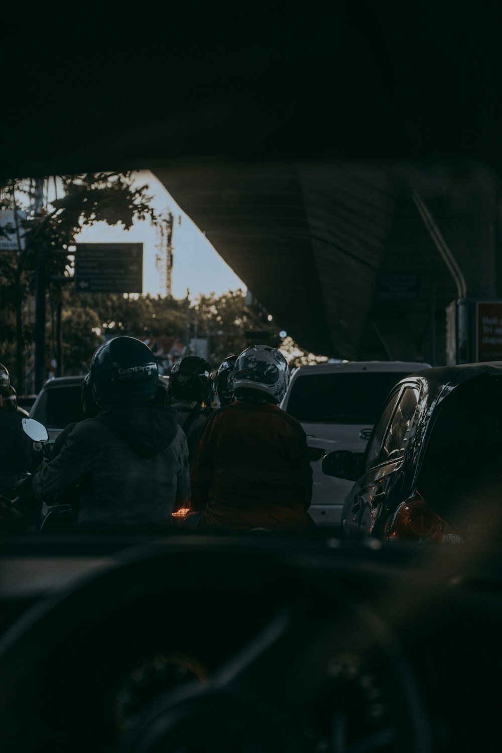 people riding on motorcycle during daytime