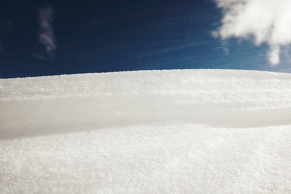 white sand under blue sky during daytime