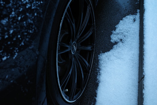 Winter tire on snow showing tread grip in cold weather