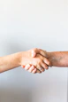 person holding hands of another person